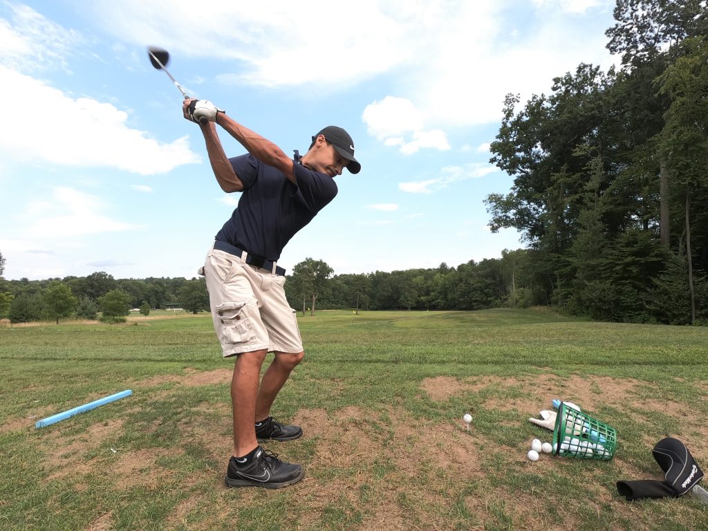 Photo credit Golfible.com. A man swinging a golf club