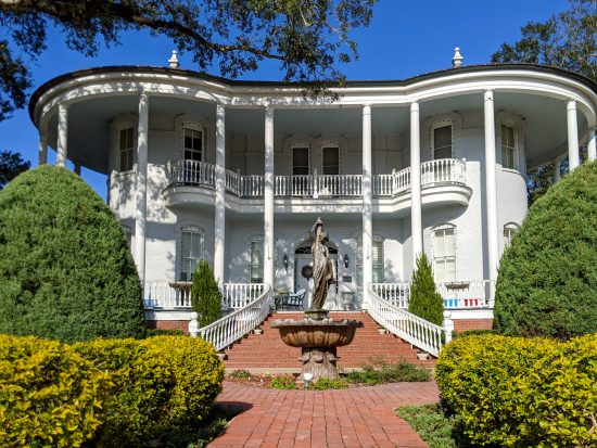 The elegantly columned Steamboat House is one of dozens of historic buildings in two historic districts that visitors can tour on a weekend getaway in New Iberia